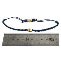 Sacha Pave Hamsa Hand Bracelet (Gold Charm Blue String)
					