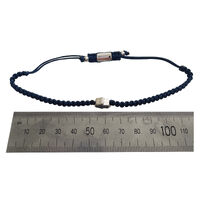Sacha Pave Hamsa Hand Bracelet (Silver Charm Blue String)
					
