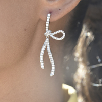 Charmi Artisan Diamante Bow Earrings
					