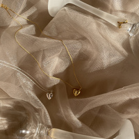 Femi Earrings & Kindred Heart Necklace Gift Set (Gold)
					