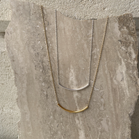 Sebier Curved Bar Pendant Necklace (Gold)
					