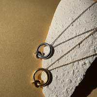 Manon Artsy Solid Knot Pendant Necklace (Gold Vermeil)
					