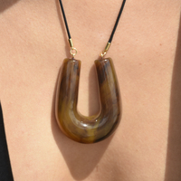 Tuscan Resin Pendant Necklace
					