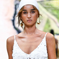 Carmela Catwalk Gold Loop Earrings
					