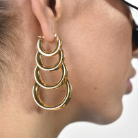 Lotta Luxury Sculptural Hoop Earrings image