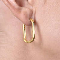 Abel Minimalist U Huggie Earrings (Gold) image