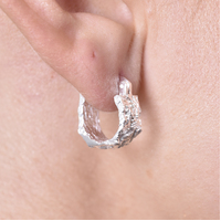 Olli Textured Sculpture Huggie Earrings (Silver) image