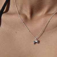 Tilda Artisan Bow Tie Pendant Necklace (Silver) image