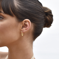 Josi Minimalist Twisted Huggie Earrings (Gold Vermeil)