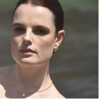 Velma Twisted U Huggie Earrings (Gold Vermeil)