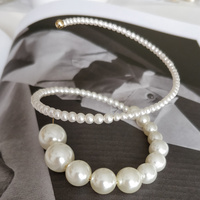 Eira Pearl Swirl Hoop Earrings