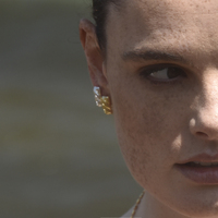 Velma Twisted U Huggie Earrings (Gold Vermeil)