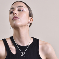 Abel Minimalist U Huggie Earrings (Silver)