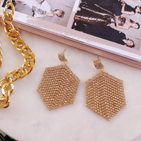 Claude Shimmering Golden Tassel Earrings