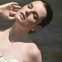 Velma Twisted U Huggie Earrings (Gold Vermeil)