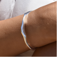 Solstice Artisan Solid Wavy Bangle (Silver)
					