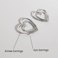 Aimee Open Heart Earrings
					