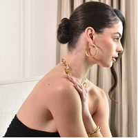 Danica 70's Gold Hoop Earrings
					