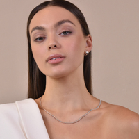 Lueur Dual Heart Silver Huggie Earrings 
					