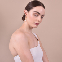 Everleigh Gold Pearl Arch Earrings
					