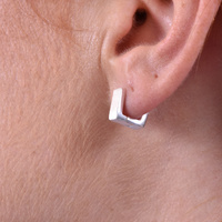 Amede Bright Silver Huggie Earrings
					