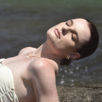 Velma Twisted U Huggie Earrings (Silver)