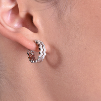 Greta Artsy Wavy Silver Hoop Earrings