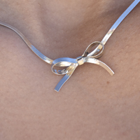 Adria Bow Tie Snake Chain Necklace (Silver)
					