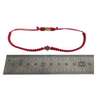 Sacha Pave Hamsa Hand Bracelet (Gold Charm Red String)
					