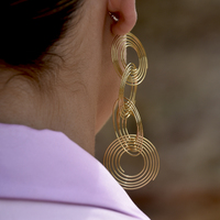 Charlie Catwalk Sculpture Loop Earrings
					