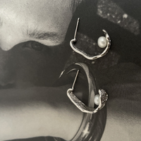 Delmare Artsy Sculpture Curve Pearl Earrings 
					