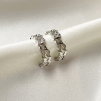 Greta Artsy Wavy Silver Hoop Earrings