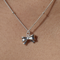 Tilda Bow Earrings & Pendant Necklace & Ring Gift Set (Silver)
					