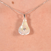 Eve Pearl Pendant Necklace
					