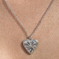Corena Petal Embossed Heart Pendant Necklace (Silver)
					