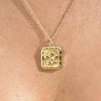 Coretta Embossed Flower Pendant Necklace (Gold)
					