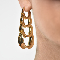 Lotta Luxury Sculptural Hoop Earrings