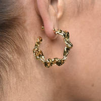 Dejouer 24K Sculptured C Hoop Earrings
					
