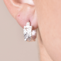 Olli Textured Sculpture Huggie Earrings (Silver)