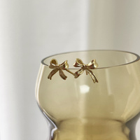 Tilda Bow Earrings & Pendant Necklace Gift Set (Gold)
					